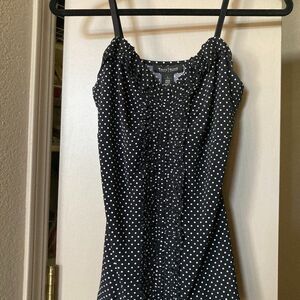 Sleeveless White House Black Market tank top, featuring an elegant black and whi